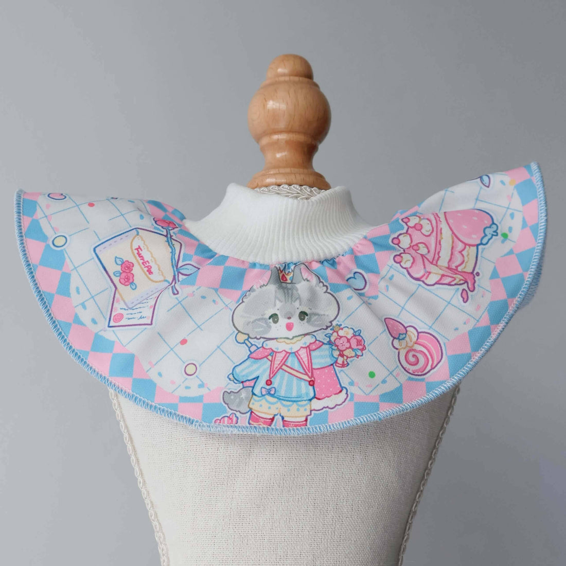this shows a close up deatils of our valentines pet bib in blue.