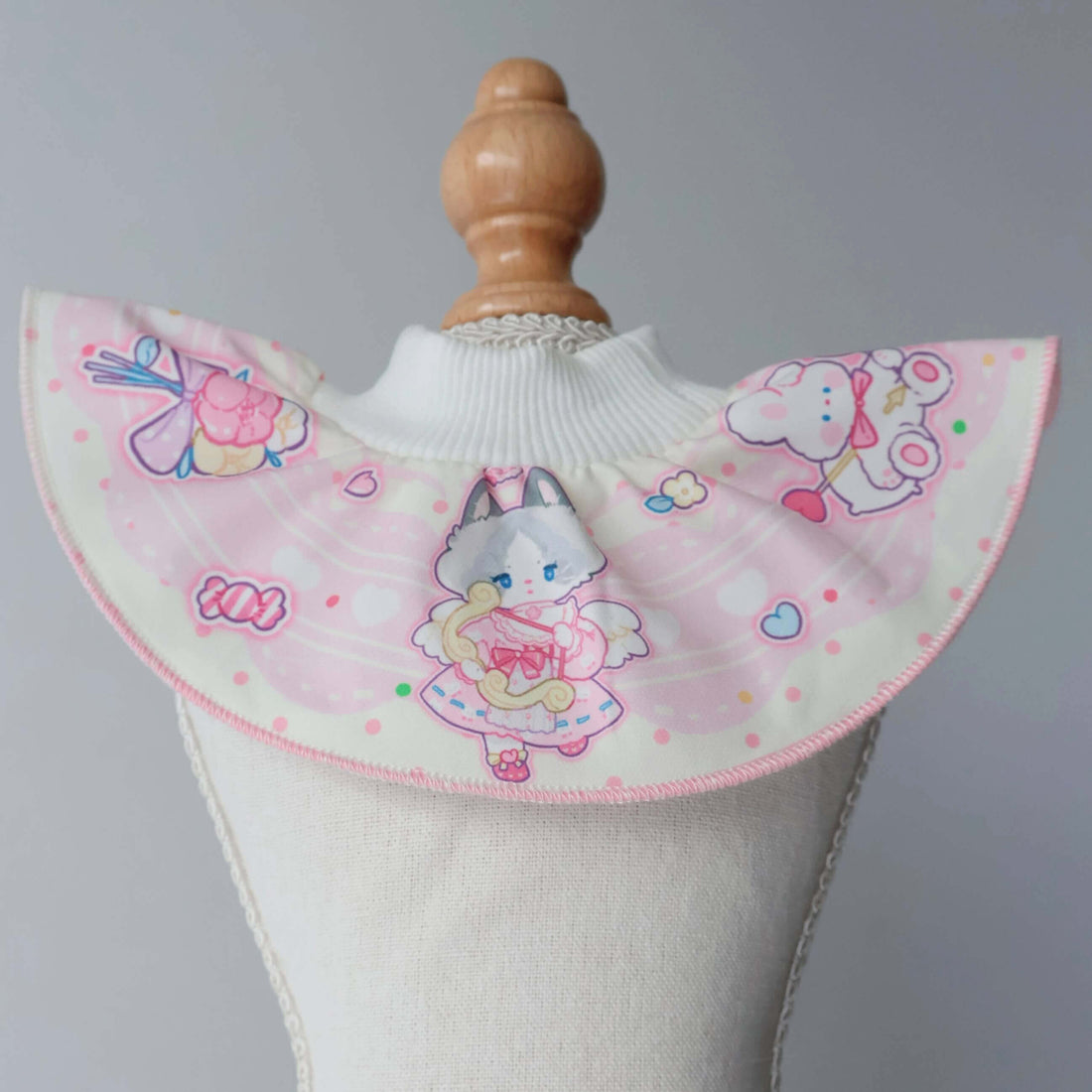 this shows a close up deatils of our valentines pet bib in pink.